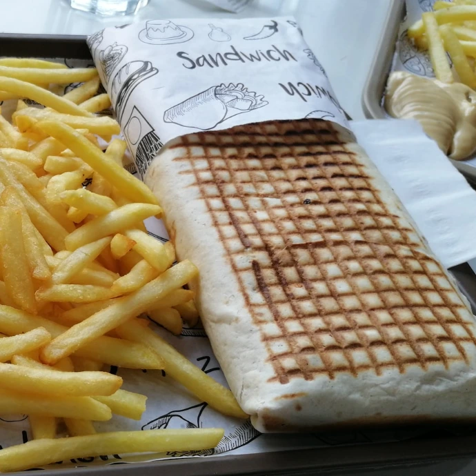 french fries on white paper